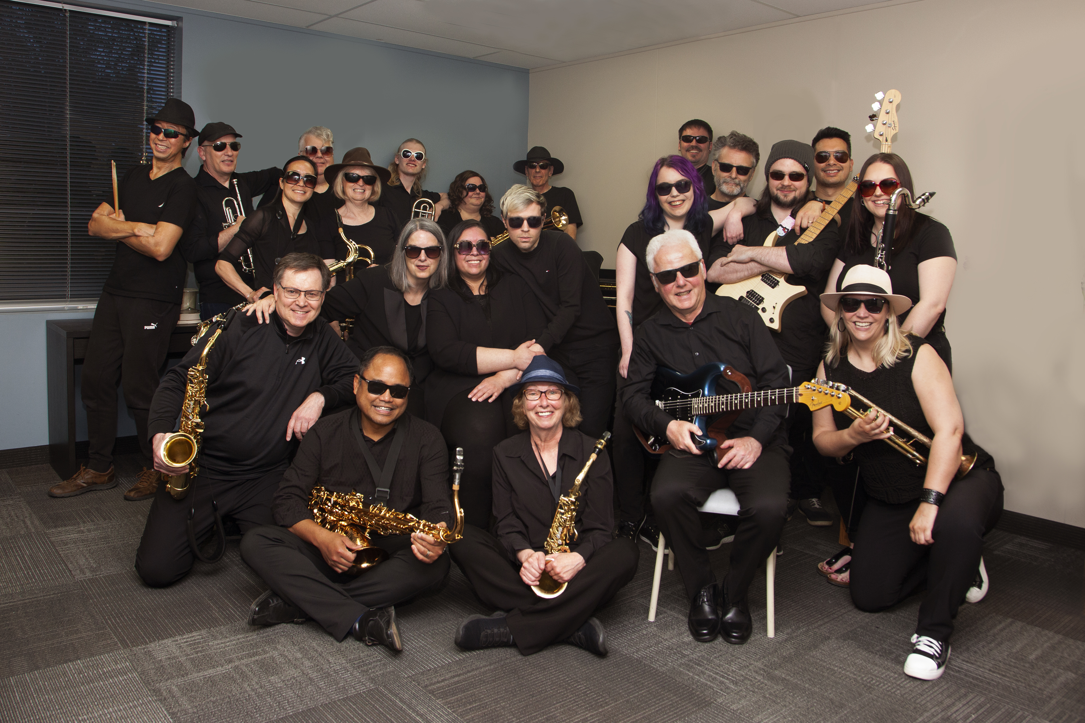 Full band photo, displaying all of the members/